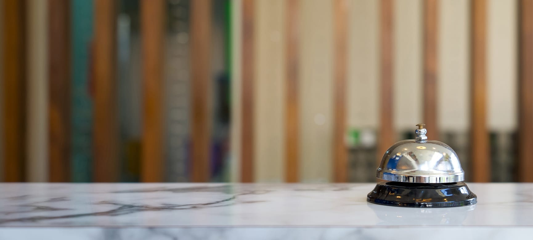 Concierge bell on reception desk