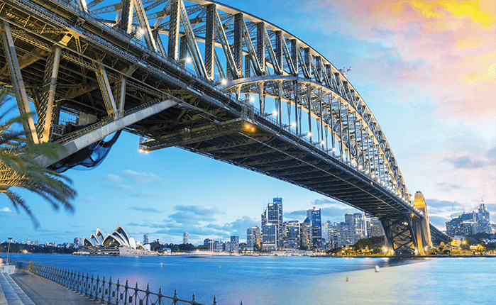 Sydney harbour bridge with Sydney opera house and Sydney CBD skyline behind