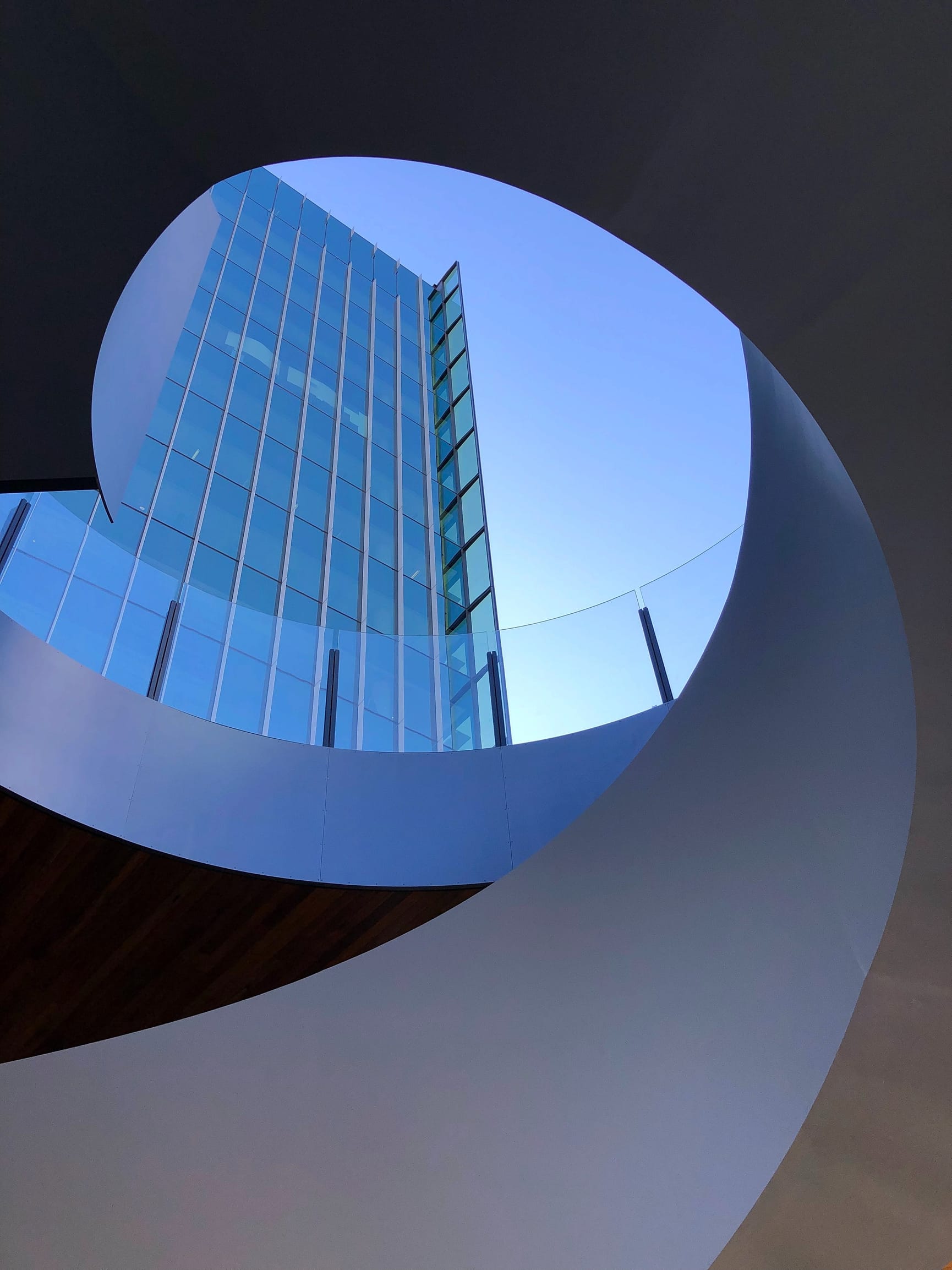 Looking up at buildings through an architecturally designed roof 