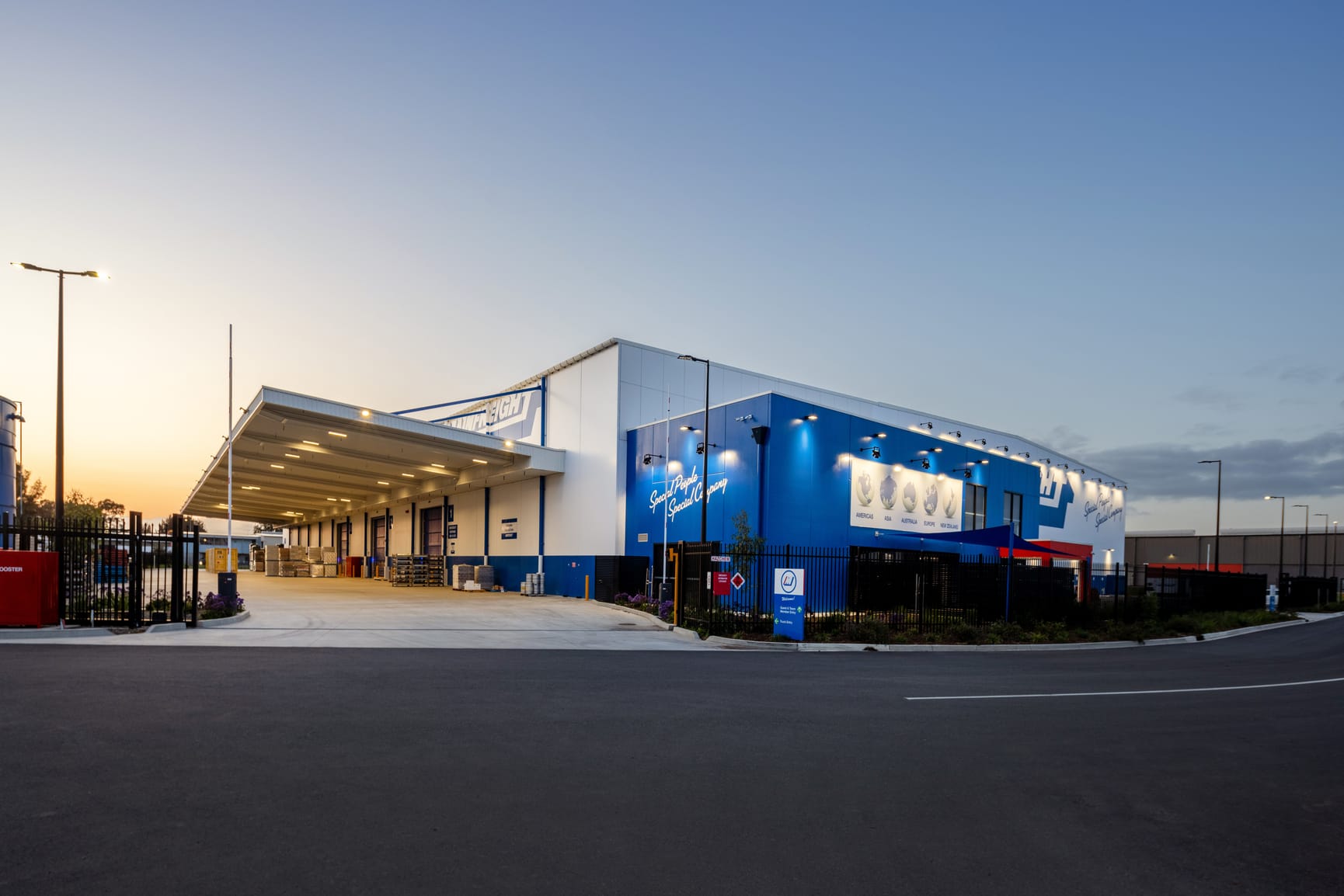 Big logistics warehouse painted blue and white